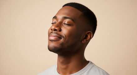 Blissful Serenity - A Young Black Mans Peaceful Smile in Soft Light.