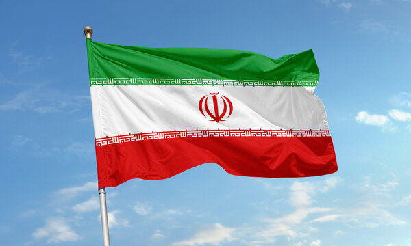 Iranian national flag waving with sky background