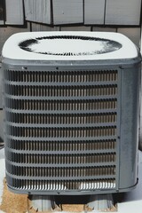 Snow-Covered Air Conditioner Unit in Winter Cold