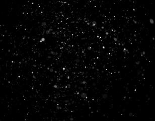 Obraz premium Snowflakes falling on dark background