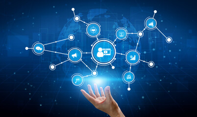 Visual representation of a hand reaching out to digital icons, symbolizing technology, communication, and global interconnectivity in a modern business landscape. Tessel