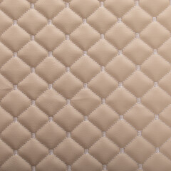 Beige leather texture with diamond-shaped ornament