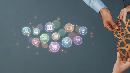 Two hands reach for colorful digital icons that symbolize technology and communication, showcasing interaction and collaboration in a modern business environment. Raster