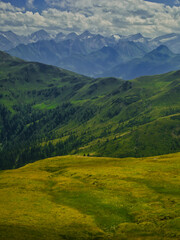 Naklejka premium View on High Tauern / Hohen Tauren natural park from mountains near Saalbach Hinterglemm Leogang ski resort during summer day