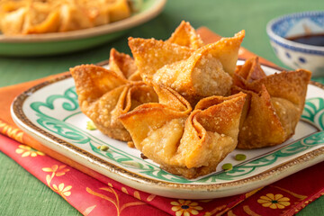 Crispy Golden Fried Dumplings Served on Decorative Plate