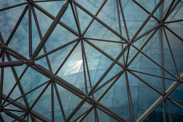 glass architecture against blue sky