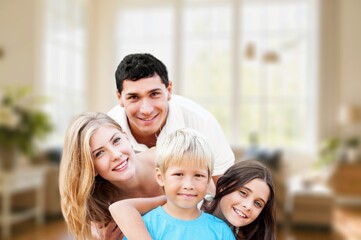 Obraz premium Happy young family and children in living room