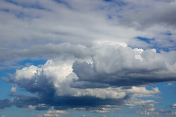 Cloudscape. Blue sky and white clouds