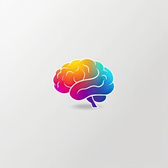 A vibrant, rainbow-hued brain illustration, rendered in a simplified, stylized form against a light gray backdrop, casts a subtle shadow