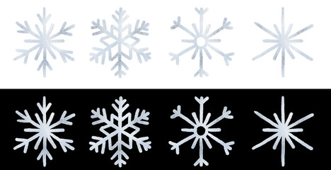 Set snowflake painted by hand with silver metallic paint. A decorative snowflake made of silver foil...