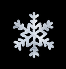A snowflake painted by hand with silver metallic paint. A decorative snowflake made of silver foil..