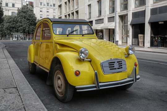 Yellow Citro&euml;n 2CV parked in Verona, Italy