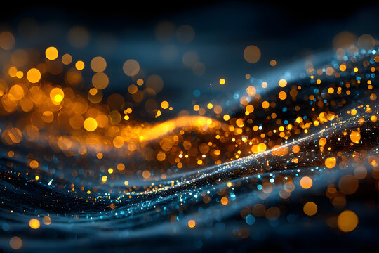 fond lumineux abstrait avec des bokeh dor&eacute;s et bleus dans l'obscurit&eacute;, repr&eacute;sentant la magie et l'illumination effets lumineux. - No&euml;l, f&ecirc;tes de fin d'ann&eacute;e d&eacute;cembre janvier