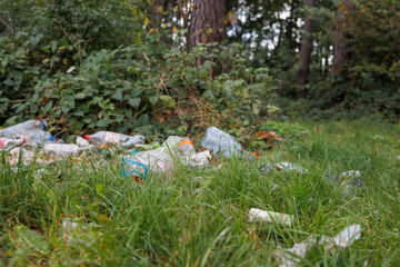 Environmental pollution with plastic waste and bottles in nature