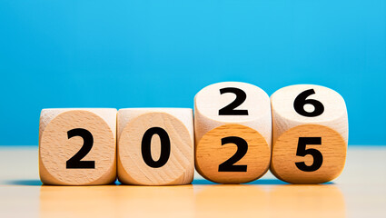 Wooden Dice Blocks Transitioning from 2025 to 2026, Future Planning, Business Growth, and New Beginnings
