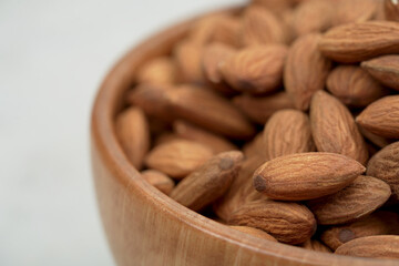 Almonds help lower cholesterol in the body and nourish the heart