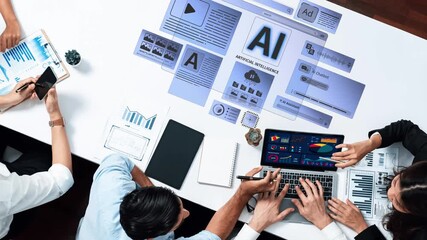 A diverse team collaborates in a modern workspace focused on artificial intelligence. They analyze data, share insights, and engage with digital tools for effective decision-making. Raster - Powered by Adobe