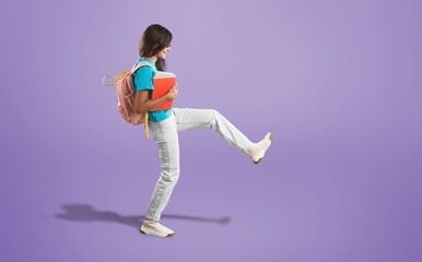 Happy young student hold stack of books