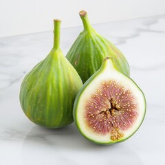 Fresh green figs on a marble surface, highlighting their unique textures and vibrant colors.
