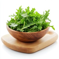 Fototapeta premium Fresh green salad in a wooden bowl on a cutting board, showcasing vibrant colors and organic textures.