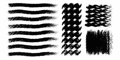 Collection of black ink brush strokes and paint splatters on white background