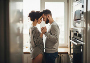 Loving couple dancing in their kitchen. A romantic and intimate photo of a happy relationship, family life, and home togetherness. Ideal for lifestyle, romance, and relationships.