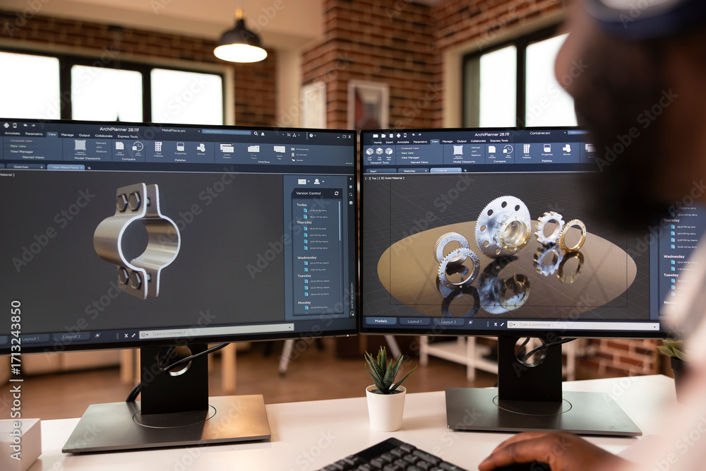 Poster african american developer working in home studio with dual monitors and cad tools. male engineer de