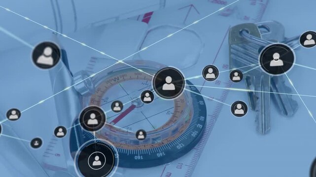 Icon fading above compass expanding network mapping connections over sketches, ruler and keyring