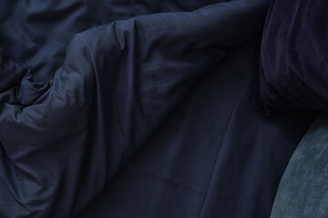 Navy blue bed sheets, top view