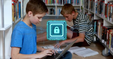 Two boys typing and reading in library causing digital padlock overlay pulsing for data security - Powered by Adobe