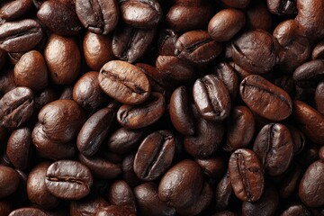 Fototapeta premium Close-up view of many roasted coffee beans
