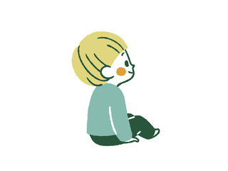 笑顔で座っている子ども