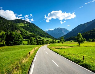 Naklejka premium Scenic mountain road through lush valley