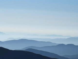 Fototapeta premium Serene blue mountain range layers under a hazy sky calm landscape