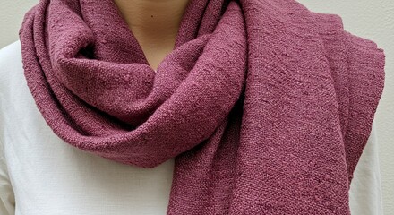 Textured Plum Scarf Drape: Woven Fabric Detail, Soft Light, Neck Adornment