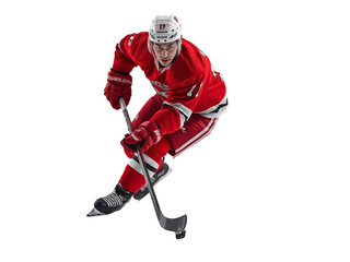 Obraz premium Focused hockey player in motion with powerful stance and poised stick handling ready for action on