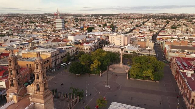 Big square in Aguascalientes Mexican downtown. Aerial dolly in