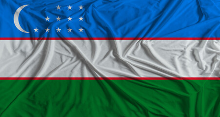 Obraz premium Uzbek flag with fabric texture background. National flag of Uzbekistan