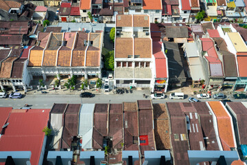 George Town, Penang Island, Malaysia. High angle view of shops and buildings rooftops. 