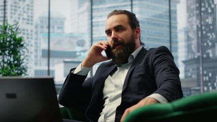 Director engaging in an executive phone call discussion with a financial broker, sharing insight on market forecasts and investment strategy, demonstrating his eye for business ideas. Camera B.