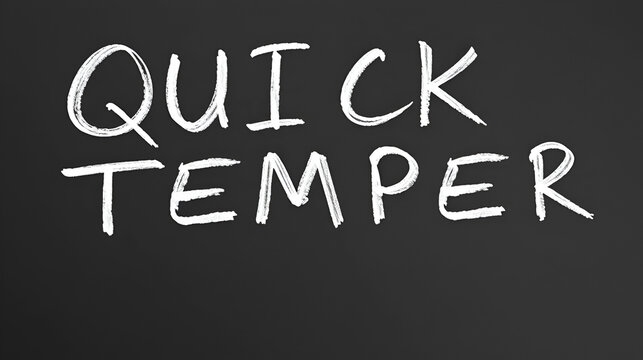QUICK TEMPER handwritten text on black chalkboard