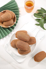 Fresh Kiwifruit Set from Guizhou China - Healthy Tropical Fruit Gift Details on White Marble Surface with Green Heart-Shaped Arrangement