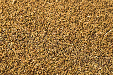 Ground Cumin Spice Powder Texture Close-Up Macro Background for Cooking and BBQ Seasoning