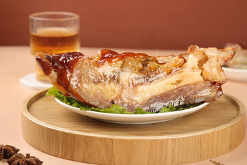 Glazed Roasted Pork Knuckle with Golden Crispy Skin - Gourmet Asian Feast with Tea