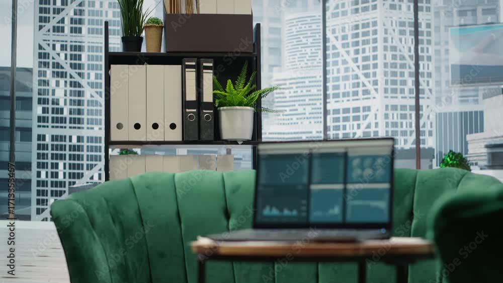Poster modern high end empty office space with a laptop running infographics and data reports, professional