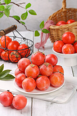 Fresh Shanxi Persimmons Display - Sweet Honey-Colored Fruit in Rustic Kitchen Setting