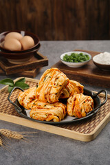 Handmade Scallion Meat Buns - Rich Succulent Rolls in Cast Iron Skillet with Fresh Ingredients