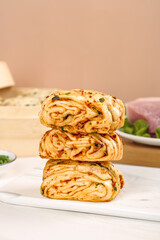 Handmade Savory Meat Rolls with Succulent Filling Stacked on Marble Board