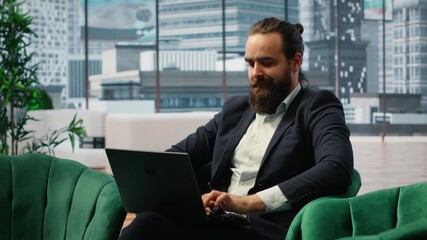 Successful male entrepreneur reflecting about career and achievements through innovation, thinking about the role of technology and digital transformation in driving company growth. Camera B. - Powered by Adobe