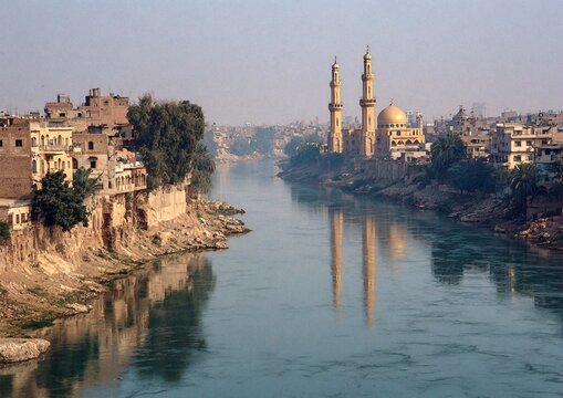 Riverfront Mosque and Cityscape